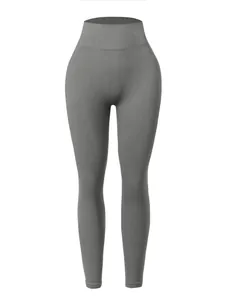 Seamless grey high-waisted ribbed leggings featuring peach butt lifting design for yoga
