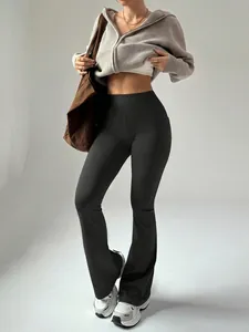 High waist flared yoga pants for women featuring a bootcut design and peach lift effect in black