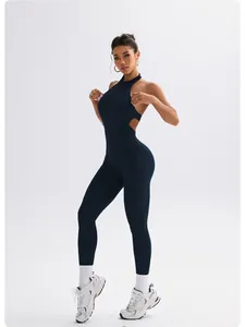 Detailed view of a navy blue halter neck yoga bodysuit with side cut-outs and long pants