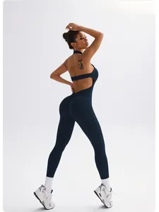 Sexy backless yoga jumpsuit for women, tight fitness bodysuit in dark blue.