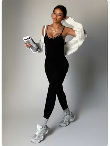 Combinaison de sport noire dos nu avec bordure blanche pour le yoga et le fitness quotidien