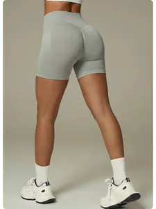 Back detail of grey seamless high-waisted butt-lifting yoga shorts showing fit
