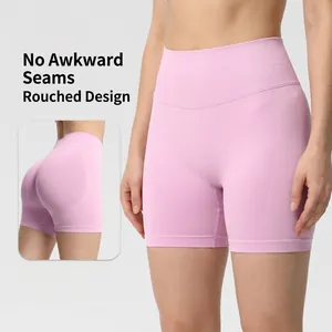 Seamless high-waisted peach butt lifting pink yoga shorts for fitness gym and running