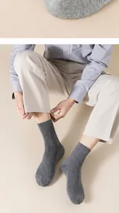 Close-up detail of reinforced toe and ribbed texture on gray breathable men's crew socks