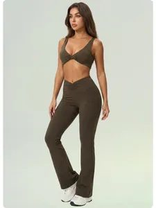 Two-piece olive green yoga set with twisted sports bra and flared leggings