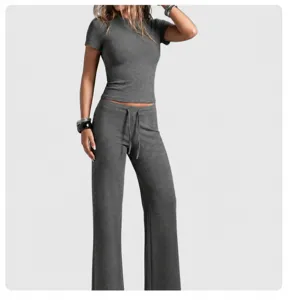 Slim fit gray yoga set featuring short sleeve t-shirt and straight leg lounge pants