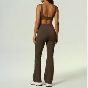 Professional back view of olive green yoga set with sports bra and flared gym leggings