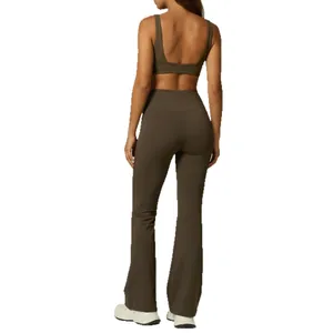 Dark olive green yoga set including sports bra and high-waisted flare leggings back view