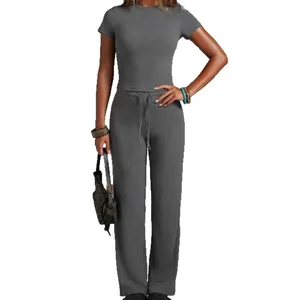 Gray two-piece yoga set with short sleeve top and straight-leg pants for outdoor fitness