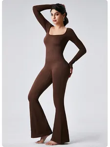 Full-length view of a ribbed brown yoga jumpsuit with flared legs and square neck.
