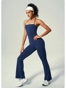 Mono de yoga azul marino con cuello halter, piernas acampanadas y ajuste entallado