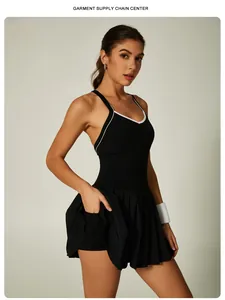 Black tennis dress with pleated skirt and built-in shorts pocket detail