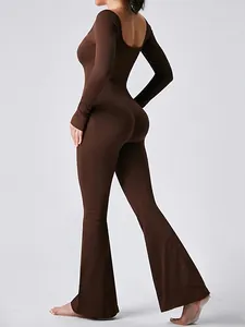 Brown long sleeve flare yoga bodysuit with tummy control and butt lifting design.
