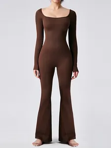 High-quality long sleeve ribbed yoga jumpsuit with flare legs in chocolate brown for fitness