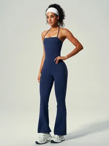 Mouwloze marineblauwe yoga jumpsuit uit één stuk met uitlopende pijpen en slanke pasvorm