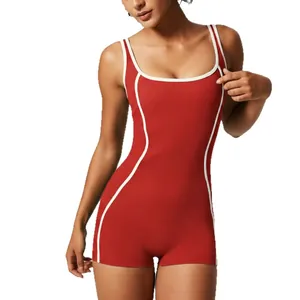 Red sleeveless yoga romper featuring white contrast trim and a slim-fit athletic design.