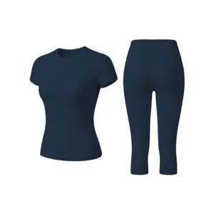 Women's navy blue quick-dry workout set including short-sleeve top and 3/4 leggings.