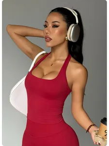 Close-up of a seamless halter neck sports tank top in deep red for yoga and fitness.