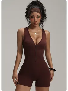 Close-up of a brown front-zipper yoga bodysuit for women, highlighting athletic slim fit