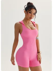 Detailed view of pink ribbed sleeveless hooded yoga jumpsuit on fit female model