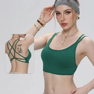 Green cross-back sports bra with double straps for fitness, yoga, and high-impact training.