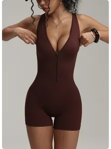 Close-up of brown sleeveless yoga romper with front zipper and ribbed texture