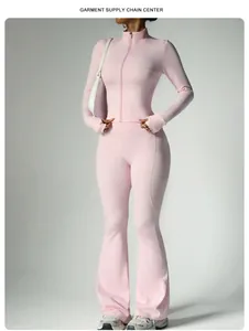 Detailed shot of women's pink zippered yoga jacket paired with flare leggings fitness set