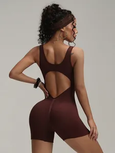 Professional women's backless brown yoga jumpsuit for gym and fitness workout