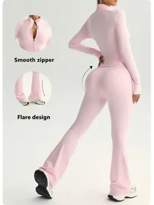 Close-up of pink long-sleeve yoga jacket with smooth zipper and flared workout pants