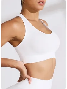 Detail of white ribbed sports bra showing seamless design and fabric texture