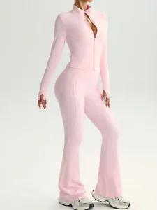 Slim fit baby pink long sleeve zipper jacket and high waist flared yoga pants gym set