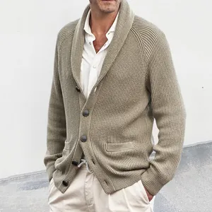 Detailed shot of a stylish men's olive knit cardigan featuring a shawl collar and buttons