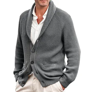 Detailed shot of men's grey shawl collar knit cardigan showing texture and button details
