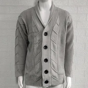 Detail view of men's grey cable knit cardigan with shawl collar and buttons.