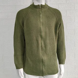 Close-up view of the olive green ribbed knit cardigan featuring a full-length zipper.