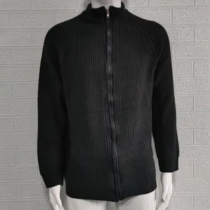 View of men's black ribbed knit cardigan sweater featuring a full zipper and warm mock neck