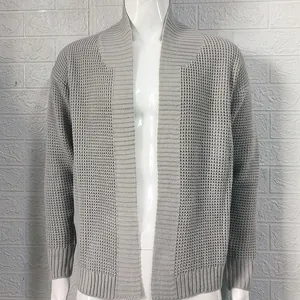 Close-up of gray waffle knit texture on men's open-front cardigan with shawl collar.