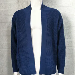 Close-up of men's navy blue waffle knit cardigan sweater with open front