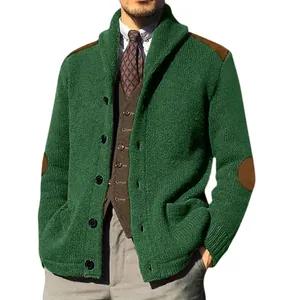 Macro view of green knitted cardigan featuring vintage brown elbow and shoulder patches
