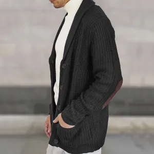 Detailed side view of a men's black knit shawl collar cardigan with suede elbow patches