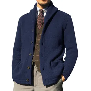 Detailed view of navy blue men's knitted cardigan with thick texture and shawl collar.