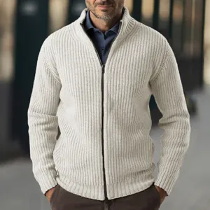 Detailed view of a white ribbed knit cardigan sweater with full zipper for men autumn