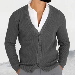 Detailed shot of grey ribbed knit V-neck cardigan with buttons on male model