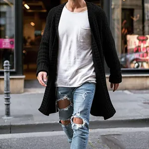 Close-up of men's black long chunky knit cardigan with loose fit streetwear style