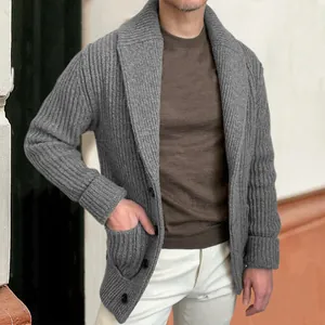 Detail view of men's grey ribbed knit shawl collar cardigan with buttons and pockets