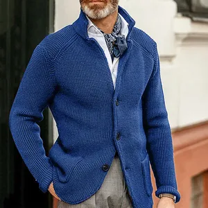 Detailed view of blue waffle knit cardigan featuring stand collar and button closure