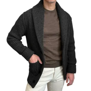 Detail of men's dark grey shawl collar knit cardigan sweater with ribbed texture