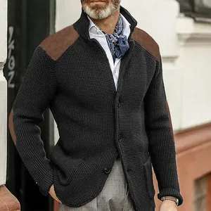 Detail of men's knitted cardigan with brown suede shoulder and elbow patches