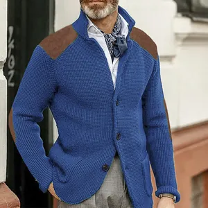 Detailed view of men's blue waffle knit cardigan with brown shoulder and elbow patches