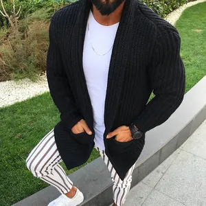 Detailed view of a men's black chunky knit cardigan featuring a ribbed texture design